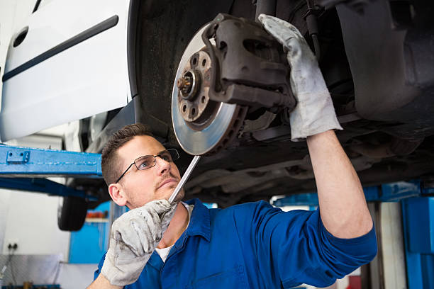 istock Focused mechanic adjusting the wheel 467714998