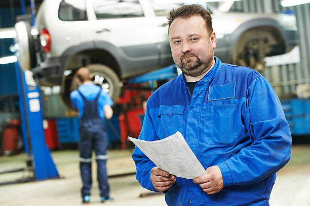 istock smiling repairman auto mechanic 467719004