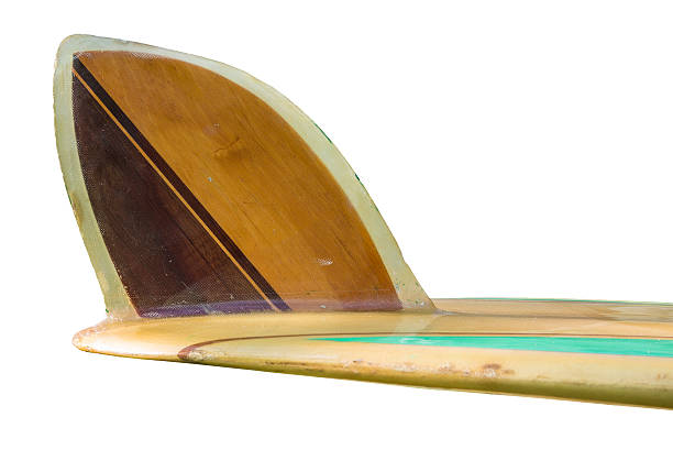 istock Vintage 60's Surfboard fin isolated on white 467720412
