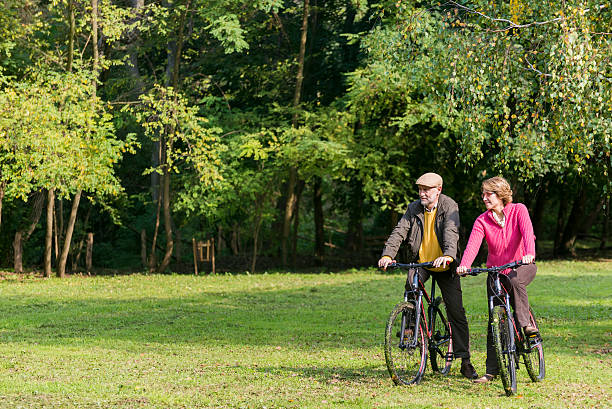 istock Senior couple riding bicycles 467720562