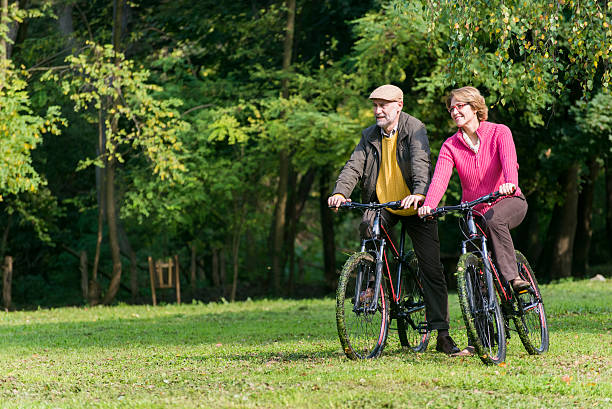 istock Senior couple riding bicycles 467720564