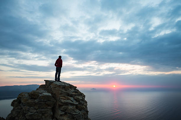single man contemplates the view.