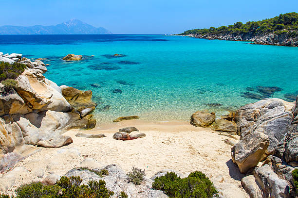 istock Rocky cliff above the beautiful clear water 467722077