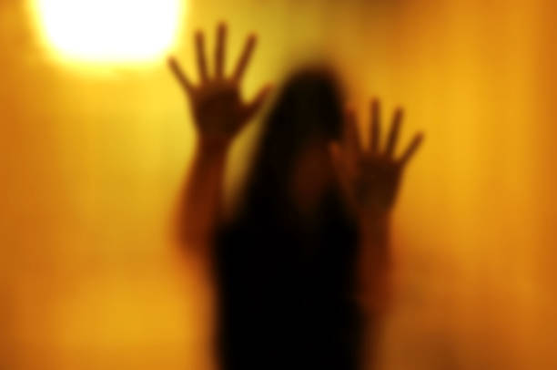 istock Woman behind the matte glass 467724250