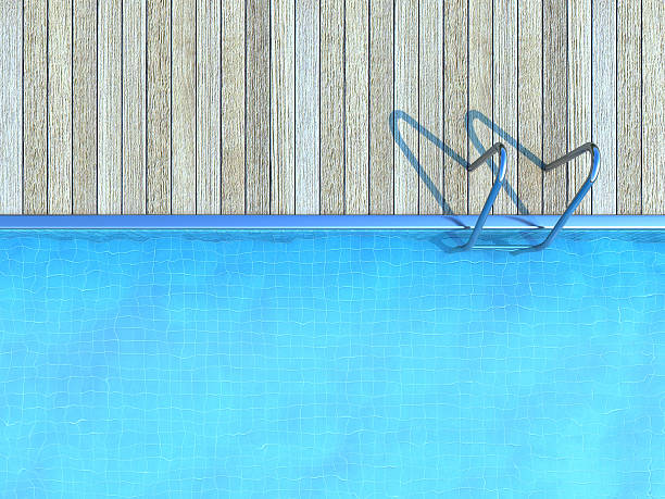 istock swimming pool with wooden deck 467725540
