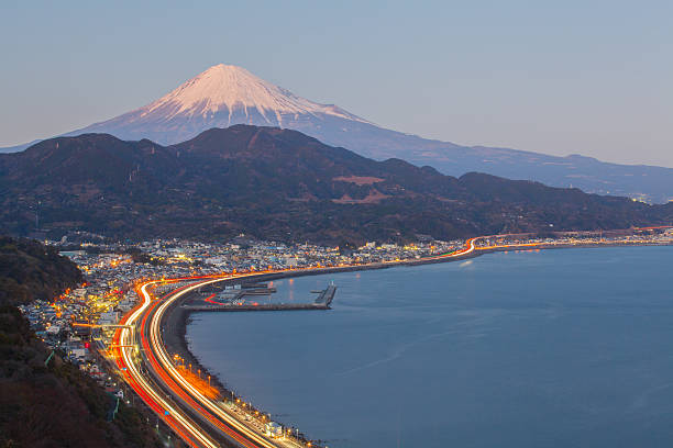 Suruga bay with mountain fuji View of Tomai expressway and Suruga bay with mountain fuji at Shizuoka prefecture bullet train mount fuji stock pictures, royalty-free photos & images