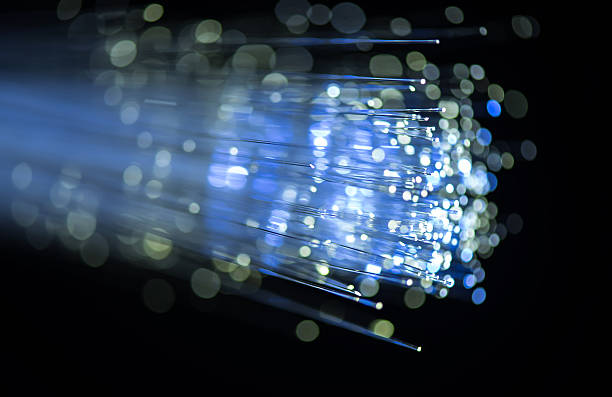 istock Glowing blue and silver fiber optical cables 467729330