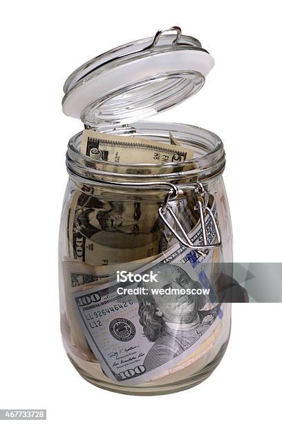 Money In The Jar Isolated On White Background Stock Photo - Download Image Now - 2015, Banking, Bundle