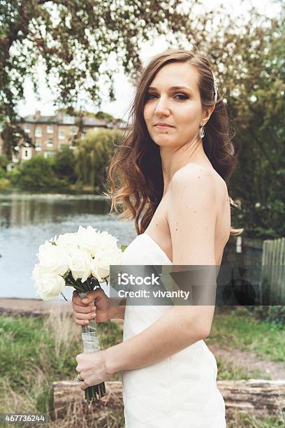 Beautiful Bride By A Lake Stock Photo - Download Image Now - 2015, Adult, Beautiful People