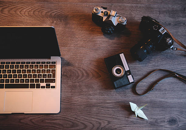 istock Photographer's equipment on desk 467736280