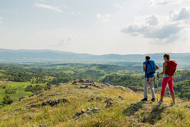 istock A young couple hiking on the mountain  467736300