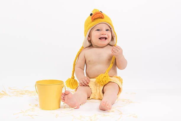 пасха ребенок в костюм утки - baby chicken eggs young bird easter стоковые фото и изображения