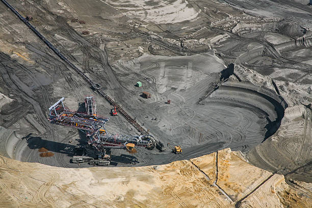 istock Large excavators in coal mine, aerial view 467740014