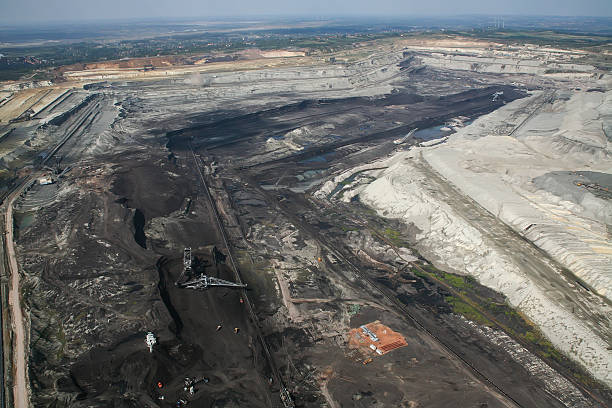 istock Large excavators in coal mine, aerial view 467740030