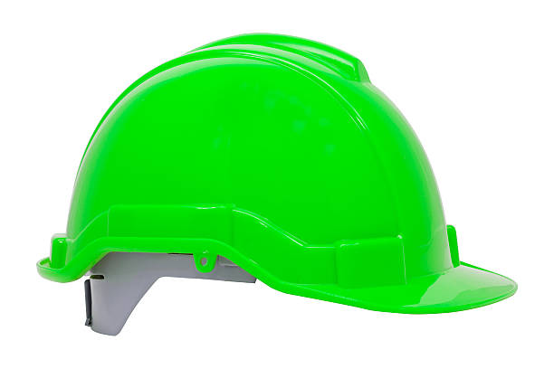 istock Green safety helmet on white background 467740172