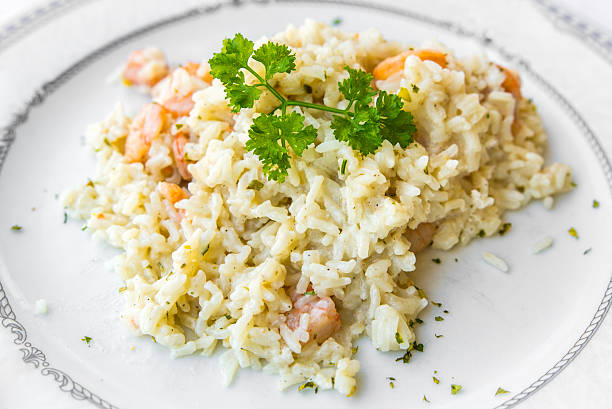 istock seafood risotto topped with parsley 467741716