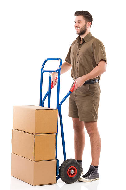 istock Mover posing with a delivering cart 467744782