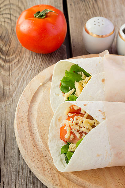 istock Chicken fajitas on wooden plate 467755978