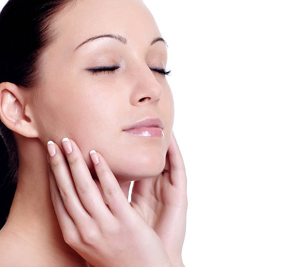 istock facial massage isolated on white 467759168
