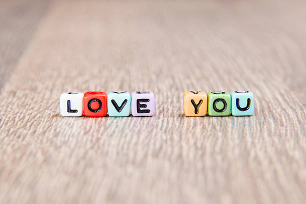 istock word love is built of colored cubes 467759259