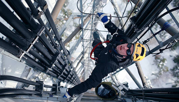 istock Telecommunication manual high worker engineer repairing antenna 467760407