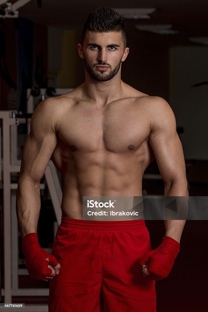 Dangerous Looking MMA Fighter Muscular Boxer MMA Fighter Practice His Skills Active Lifestyle Stock Photo