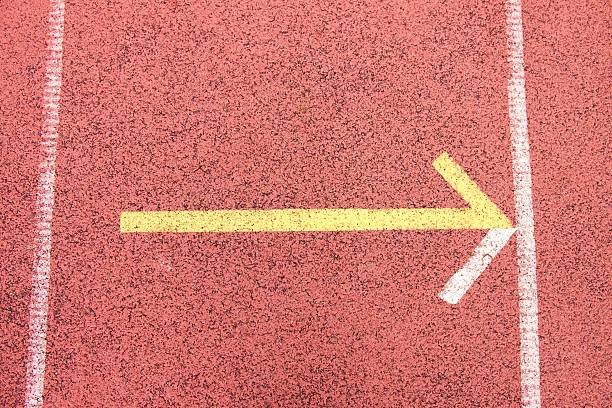 istock White lines and texture of running racetrack, red rubber racetracks 467763002