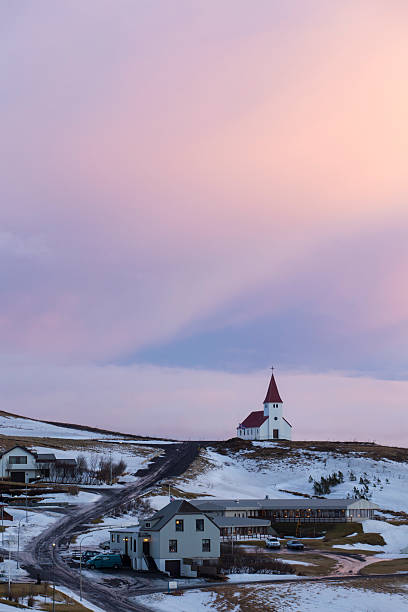 Hilltop Church of Vik, Iceland during sunset stock photo
