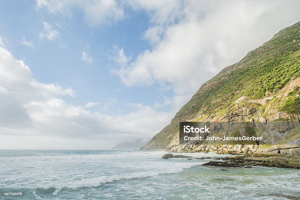 Rocky beach Rocky seascape next to the Atlantic ocean in the Cape Town City Atlantic Ocean Stock Photo