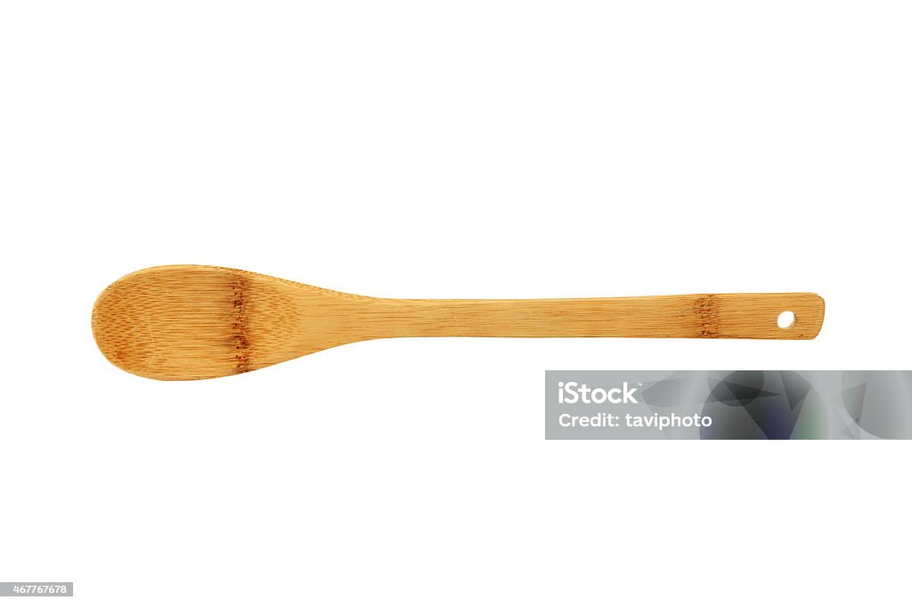 traditional wood spoon over white background traditional bamboo wood spoon isolated over white background, vintage object 2015 Stock Photo