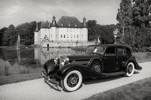 Jüchen, Germany - August 1, 2014: Mercedes Benz 540K W29 vintage classic car in the park in front of Schloss Dyck. The car is on display during the 2014 Classic Days event at Schloss Dyck. 