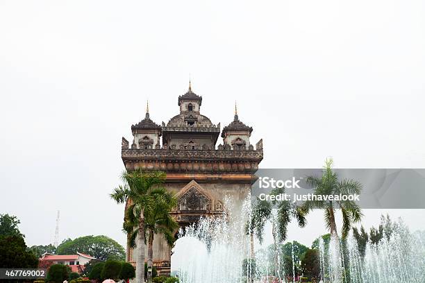 Victory Monument Patuxai And Fountain In Vientiane Stock Photo - Download Image Now - 2015, Architecture, Asia