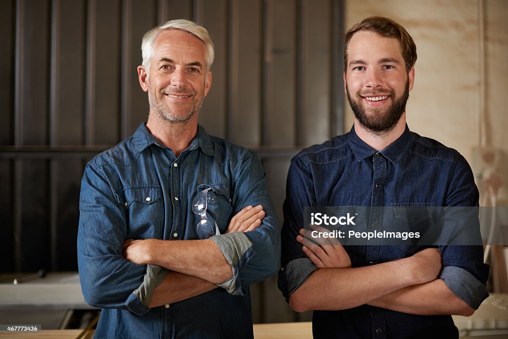 Father and son, master and apprentice Portrait of a father and son standing in a workshophttp://195.154.178.81/DATA/istock_collage/0/shoots/783498.jpg Craftsperson Stock Photo