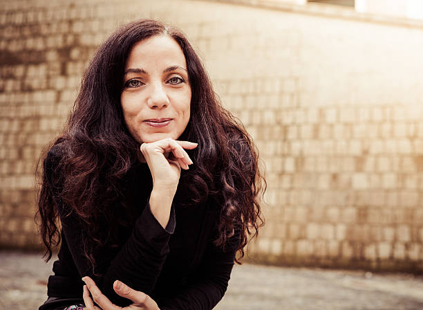 istock Smiling Woman Looking at Camera 467774147