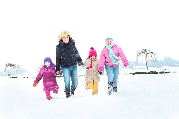 istock Happy family enjoying in winter 467774951