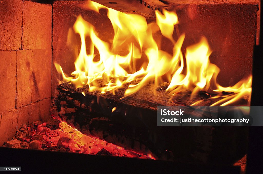 Fire in fireplace flames dance in fireplace Affectionate Stock Photo