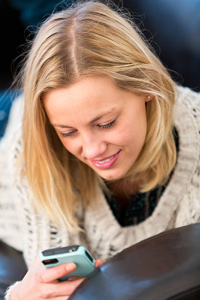 istock WYoung woman using smartphone 467776017