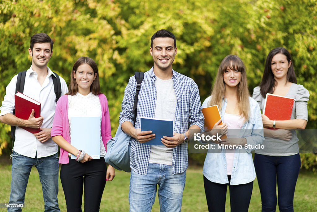 Students group Students in a park Adult Stock Photo