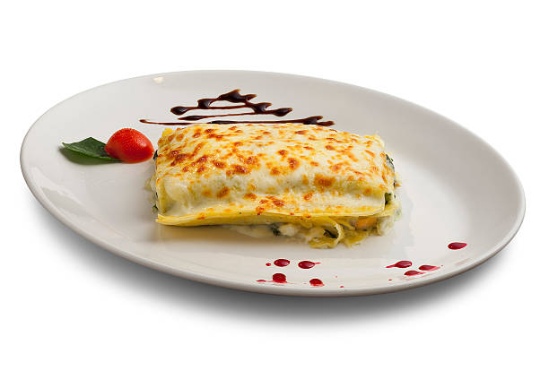istock piece of lasagna with meat in a white bowl 467778019