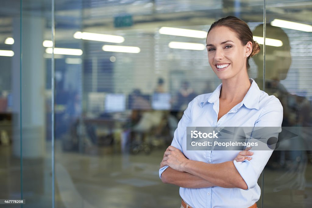 She has this office running smoothly A cropped shot of a smiling businesswoman in the officehttp://195.154.178.81/DATA/istock_collage/0/shoots/782318.jpg 2015 Stock Photo