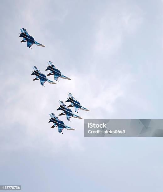 Aerobatic Team Russian Knights On The Su27 Stock Photo - Download Image Now - 2015, 70th Anniversary, Aerobatics