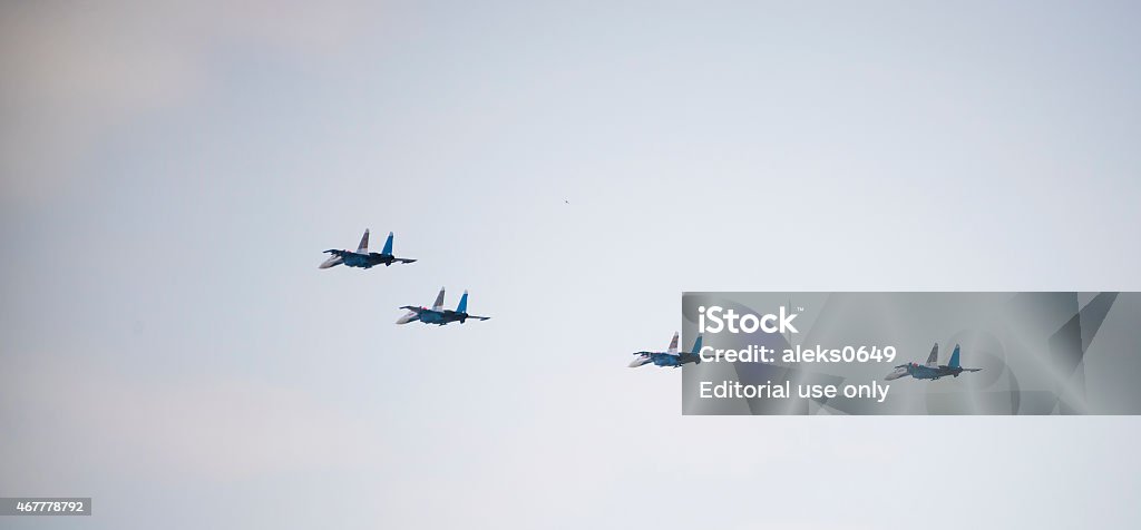 Aerobatic team "Russian Knights" on the Su-27  Rostov-on-Don, Russia- March 21, 2015:  Aerobatic team "Russian Knights" on the Su-27 at the event for the 70th anniversary of Victory in Great Patriotic War 2015 Stock Photo