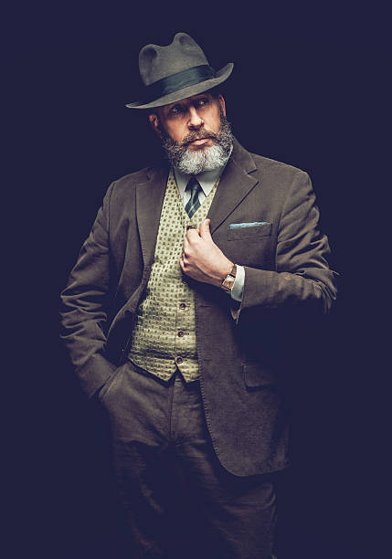 istock Serious Man in Formal Wear on Black Background 467781786