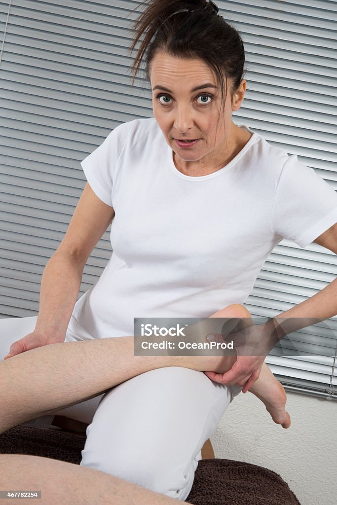 Foot and legs massage Foot and legs massage, alternative therapy 2015 Stock Photo