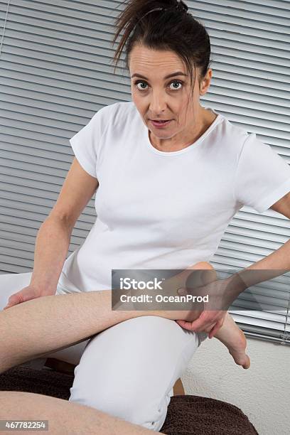 Foot And Legs Massage Stock Photo - Download Image Now - 2015, Alternative Therapy, Aromatherapy
