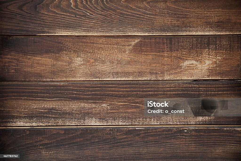 Dark brown board texture Dark brown board texture background Textured Stock Photo