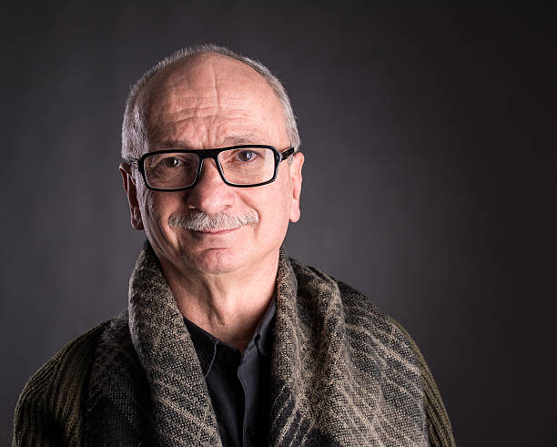 istock Smiling elderly man in glasses 467787170