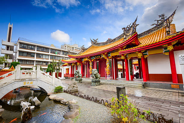 Shrine in Nagasaki Nagasaki, Japan - December 9, 2012: Front gate and pond of Confucius Shrine. Founded in 1893, it is considered the only Confucius shrine built outside of China by ethnic Chinese. nagasaki prefecture photos stock pictures, royalty-free photos & images