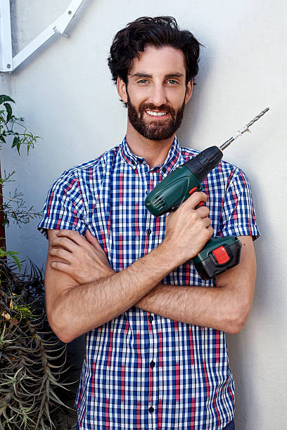 istock portrait drilling handyman 467791720