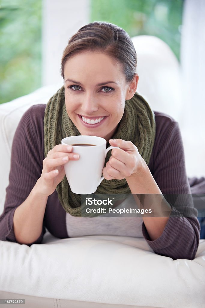 Life starts after coffee Portrait of a beautiful woman relaxing at home with a cup of coffeehttp://195.154.178.81/DATA/istock_collage/0/shoots/782431.jpg 2015 Stock Photo